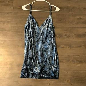 Blue velvet formal dress with subtle ties on the side